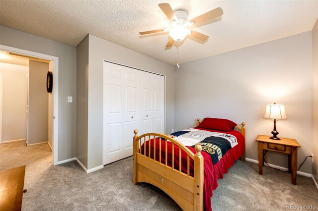 12632 W Virginia Ave, Lakewood, CO 80228 - bedroom with a closet, carpet, baseboards, and a ceiling fan