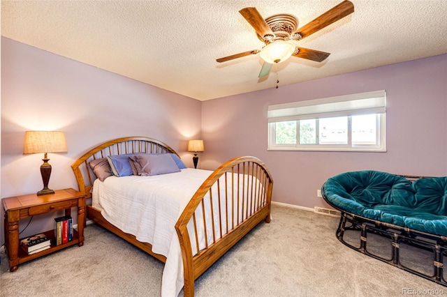 12632 W Virginia Ave, Lakewood, CO 80228 - bedroom with a textured ceiling, carpet, a ceiling fan, and baseboards