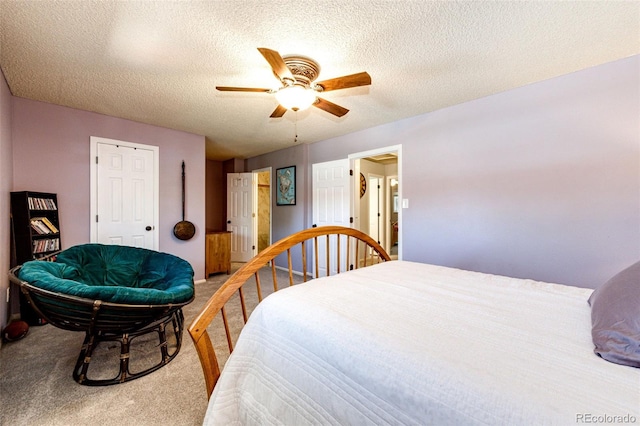 12632 W Virginia Ave, Lakewood, CO 80228 - bedroom with carpet floors, a textured ceiling, ceiling fan, and a closet