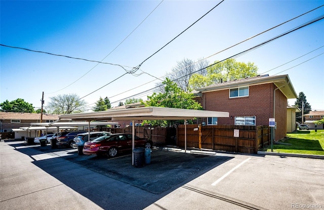 12632 W Virginia Ave, Lakewood, CO 80228 - covered parking lot featuring fence