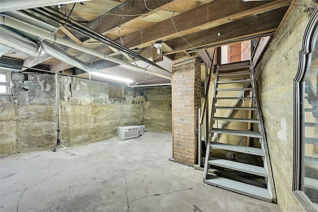 unfinished basement with stairs