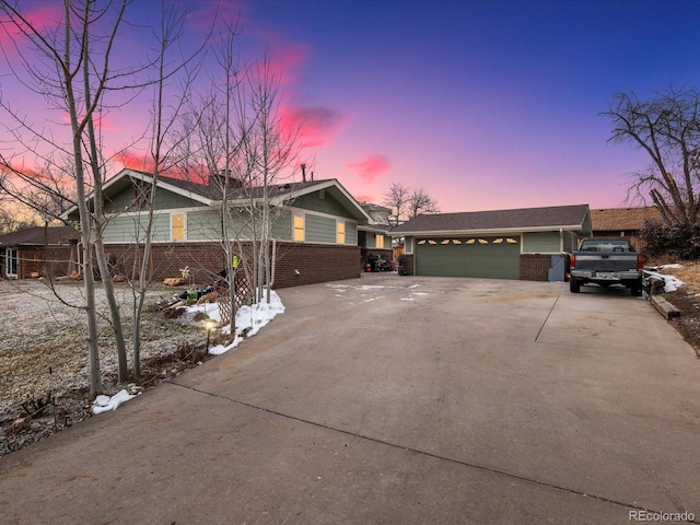 single story home with a garage