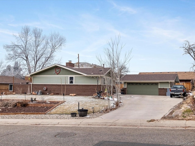 ranch-style home featuring a garage