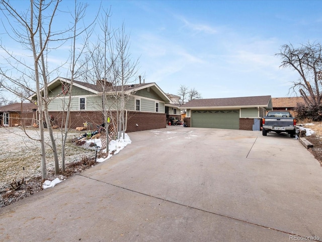 ranch-style home featuring a garage