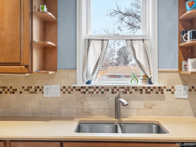 kitchen with sink and backsplash