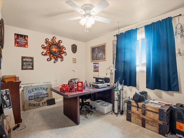 home office featuring carpet and ceiling fan