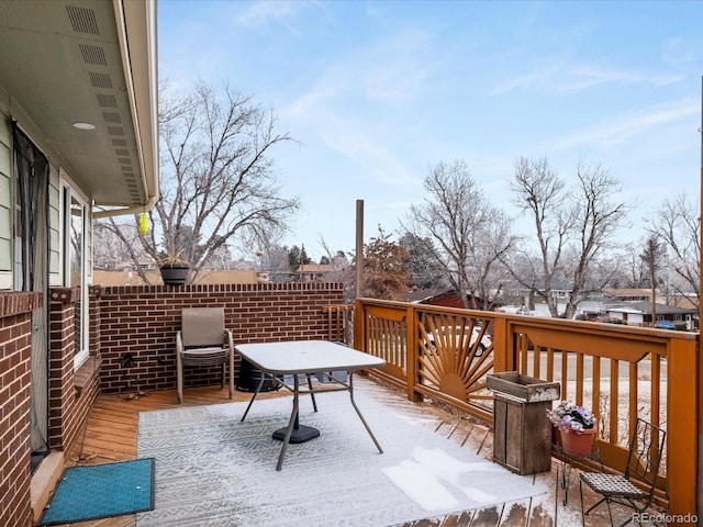 view of snow covered deck