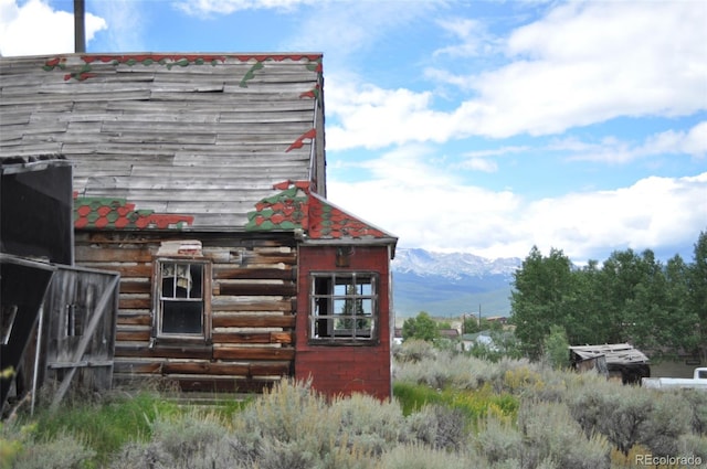 view of outbuilding with a mountain view