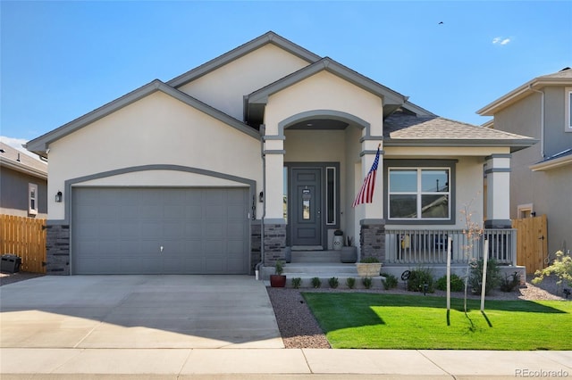 single story home with a front yard and a garage