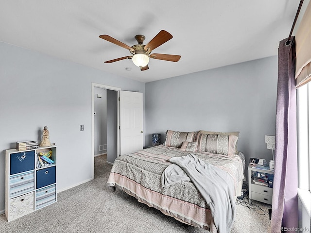 bedroom with baseboards, carpet, and ceiling fan