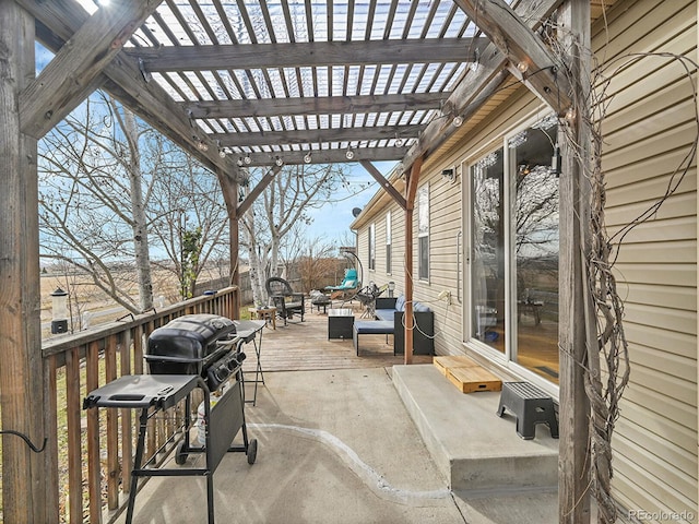 view of patio featuring area for grilling, a pergola, and a deck