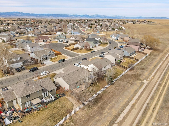 birds eye view of property featuring a mountain view and a residential view