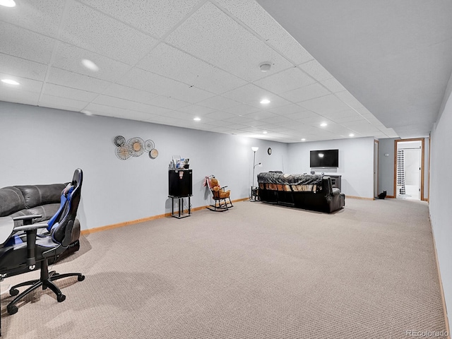 interior space with recessed lighting, a drop ceiling, and baseboards