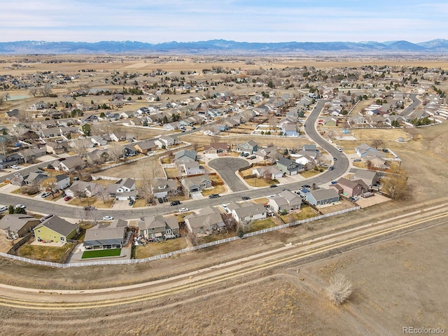 drone / aerial view with a mountain view and a residential view