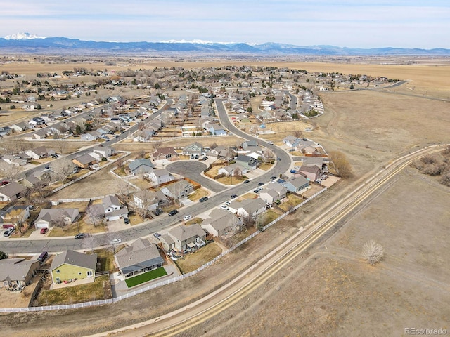 bird's eye view with a residential view and a mountain view