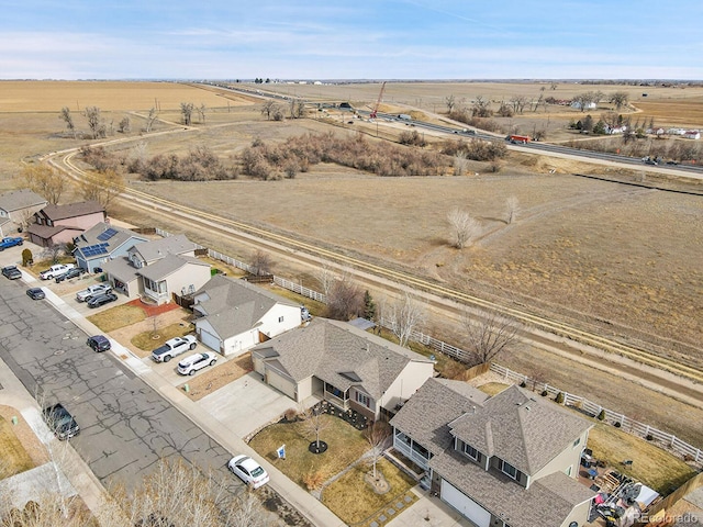 drone / aerial view featuring a rural view and a residential view