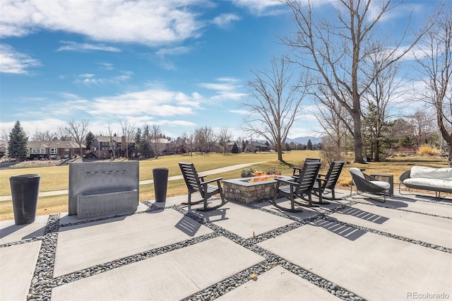 view of patio / terrace featuring a fire pit