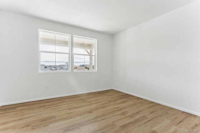 empty room featuring light hardwood / wood-style floors