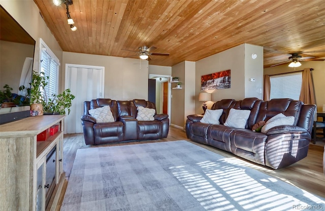 693 E Ave, Limon, CO 80828 - living area with plenty of natural light, ceiling fan, and wood finished floors