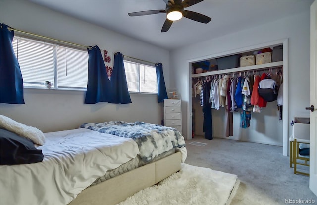 693 E Ave, Limon, CO 80828 - carpeted bedroom featuring a closet, a ceiling fan, and visible vents