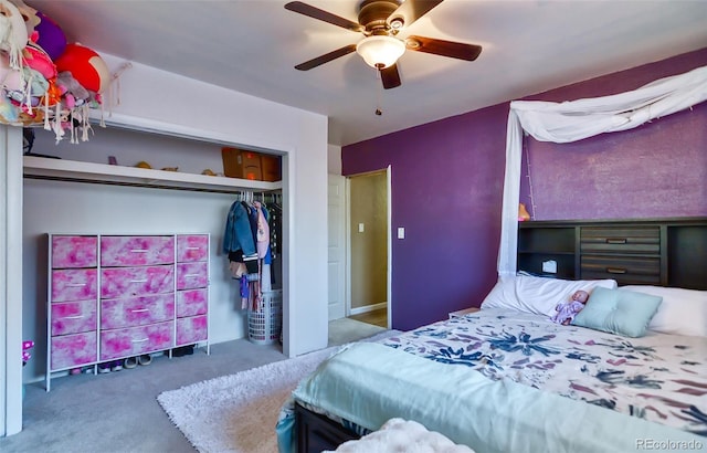 693 E Ave, Limon, CO 80828 - carpeted bedroom with a ceiling fan and a closet
