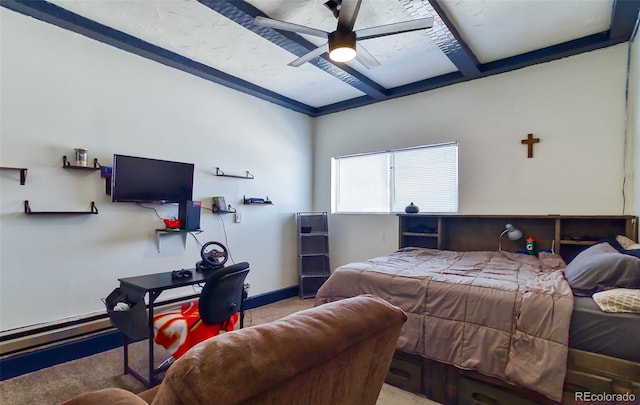 693 E Ave, Limon, CO 80828 - bedroom featuring baseboards, a baseboard radiator, and ceiling fan