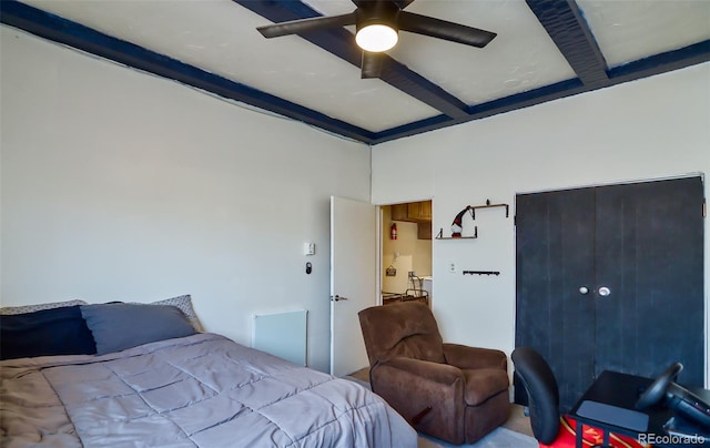 693 E Ave, Limon, CO 80828 - bedroom featuring beamed ceiling and ceiling fan