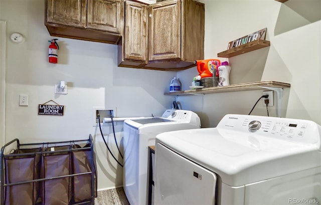 693 E Ave, Limon, CO 80828 - laundry room with baseboards, washing machine and dryer, and cabinet space