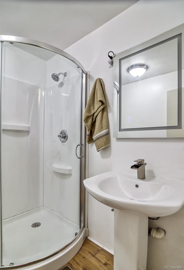 693 E Ave, Limon, CO 80828 - full bath with wood finished floors and a stall shower