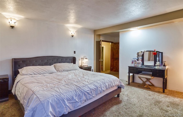 693 E Ave, Limon, CO 80828 - carpeted bedroom with a textured ceiling