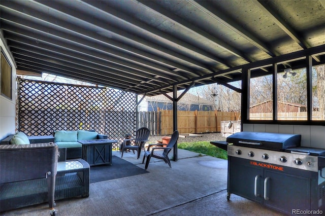 693 E Ave, Limon, CO 80828 - view of patio with a fenced backyard, an outdoor hangout area, and area for grilling