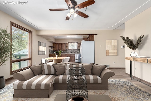 116 Schooley Rd, Bailey, CO 80421 - living room featuring a ceiling fan and light wood-style flooring