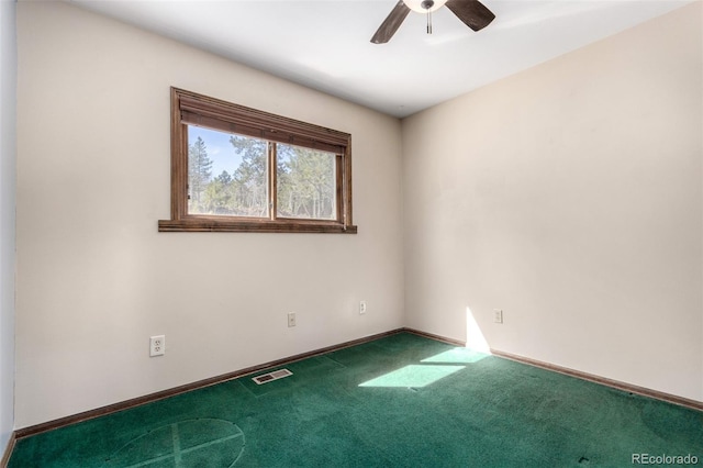 116 Schooley Rd, Bailey, CO 80421 - carpeted spare room with ceiling fan and baseboards