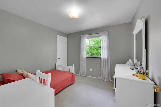 7439 S Depew St, Littleton, CO 80128 - bedroom featuring carpet flooring and baseboards