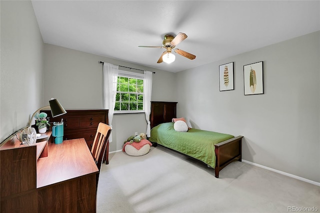 7439 S Depew St, Littleton, CO 80128 - carpeted bedroom featuring baseboards, a desk, and a ceiling fan