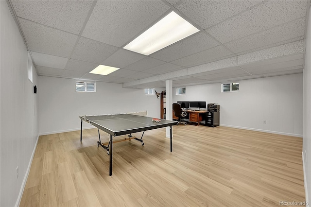 7439 S Depew St, Littleton, CO 80128 - rec room with light wood-style flooring, baseboards, a drop ceiling, and an office area