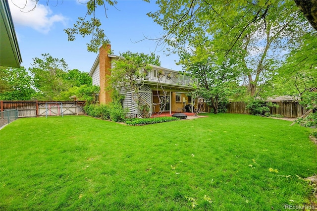 7439 S Depew St, Littleton, CO 80128 - view of yard with a patio