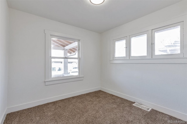 view of carpeted spare room