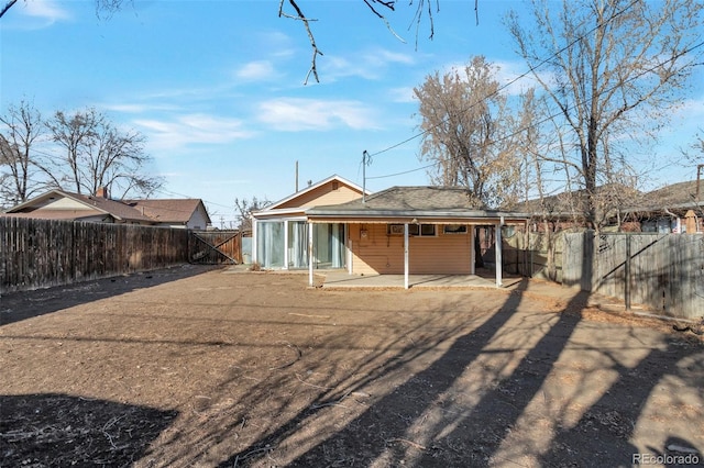 back of house featuring a patio area