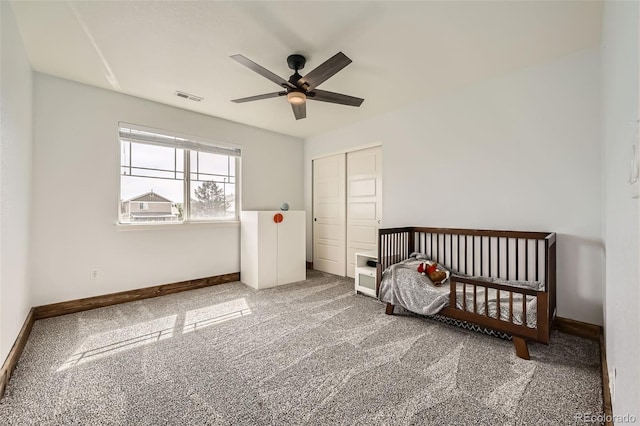 350 N Langdale Ct, Aurora, CO 80018 - bedroom featuring carpet, a closet, baseboards, and ceiling fan