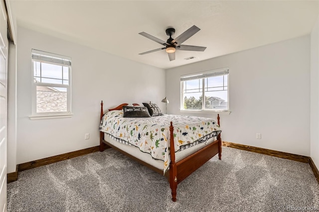 350 N Langdale Ct, Aurora, CO 80018 - carpeted bedroom with baseboards and ceiling fan