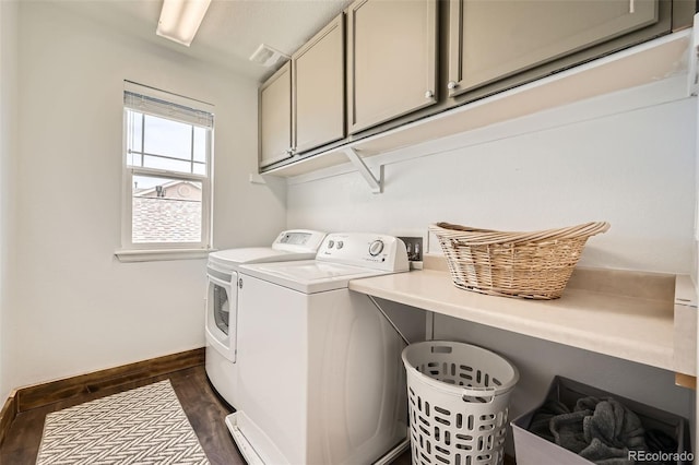 350 N Langdale Ct, Aurora, CO 80018 - laundry area with cabinet space, washer and clothes dryer, dark wood finished floors, and baseboards