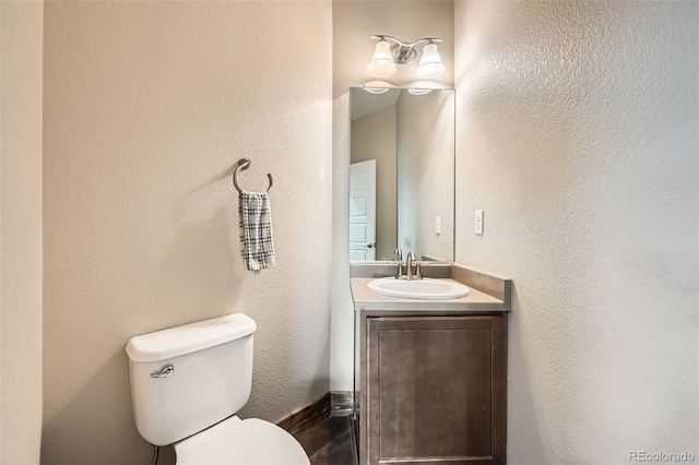 350 N Langdale Ct, Aurora, CO 80018 - half bathroom with vanity and toilet