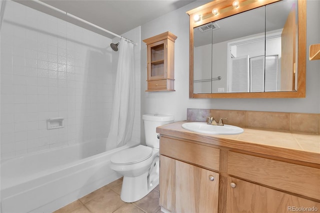 bathroom with vanity, visible vents, shower / bath combo, tile patterned floors, and toilet