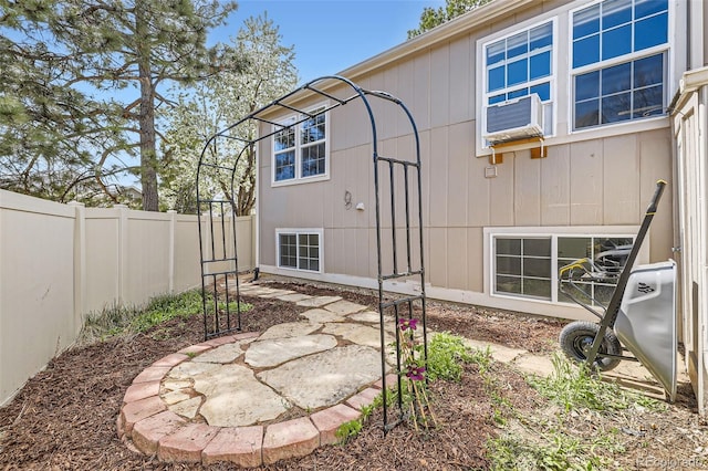 9713 W Chatfield Ave Unit H, Littleton, CO 80128 - back of house featuring cooling unit and a patio
