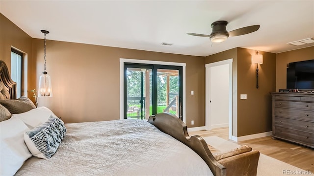 2231 Meadow Green Cir, Franktown, CO 80116 - bedroom featuring light wood-style floors and ceiling fan