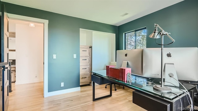 2231 Meadow Green Cir, Franktown, CO 80116 - office featuring light wood-style flooring and baseboards