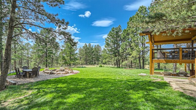 2231 Meadow Green Cir, Franktown, CO 80116 - view of grassy yard featuring a patio