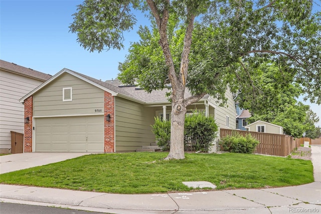 9705 Autumnwood Pl, Highlands Ranch, CO 80129 - view of front of property with concrete driveway, brick siding, and an attached garage