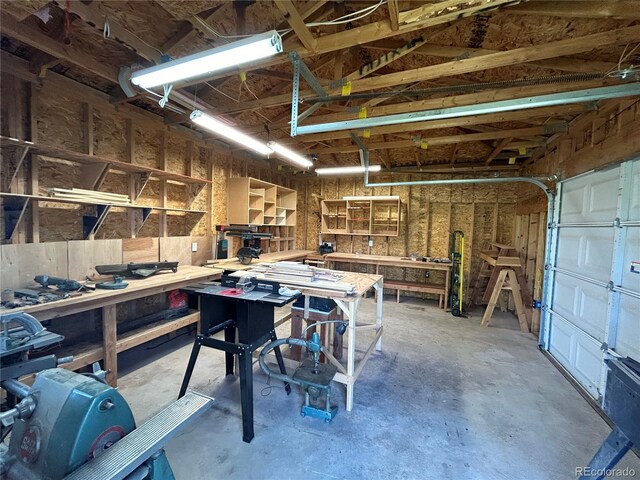 garage with a workshop area